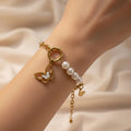 Butterfly Pearl Charm Bracelet